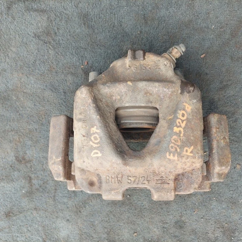 Суппорт тормозной BMW E90