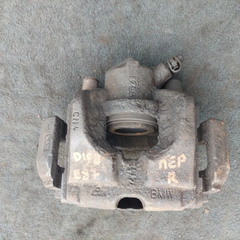 Суппорт тормозной BMW E87 LCI