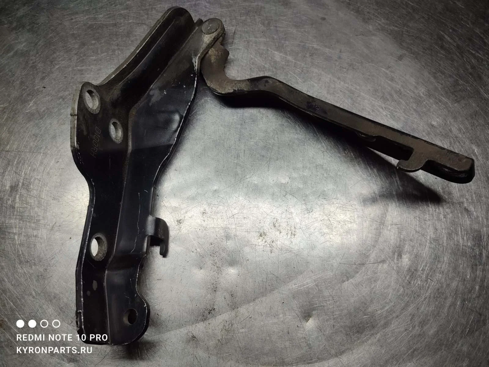 Петля капота SsangYong Kyron