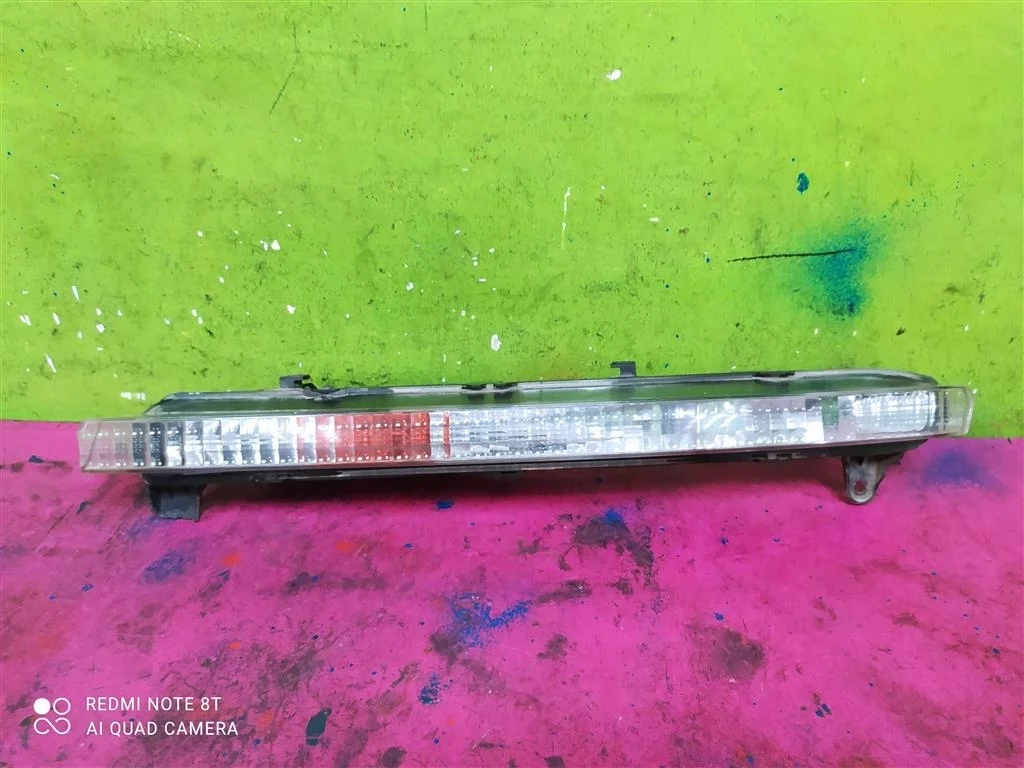 Поворотник перед бампера левый Audi Q7 2006-2009