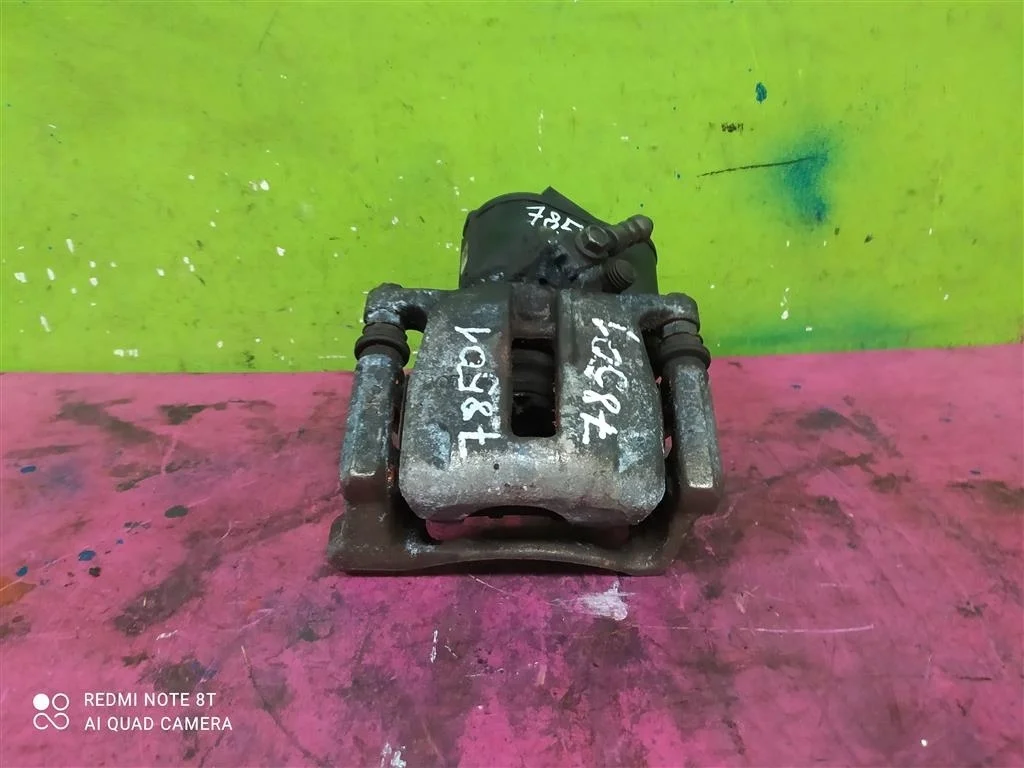 Суппорт задний левый Tiguan Passat B7 CC Audi Q3