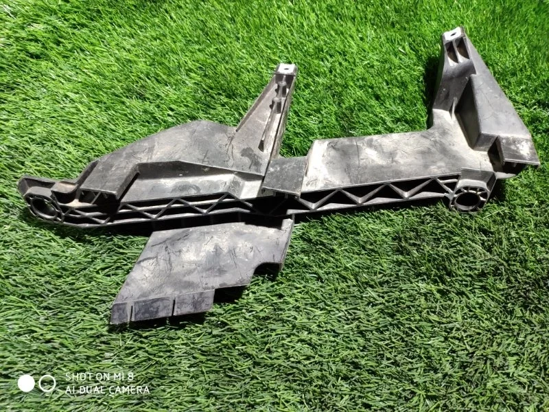 Кронштейн крепления фары BMW E83