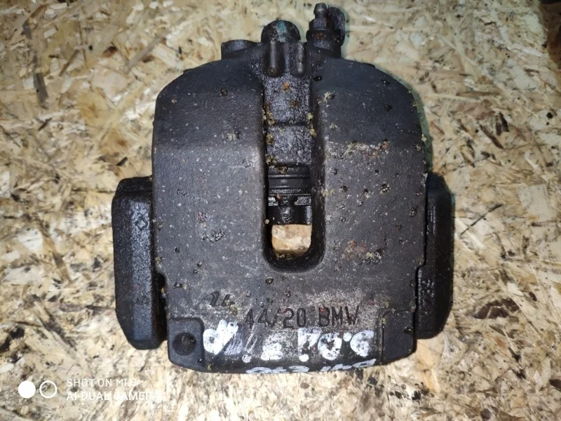 Суппорт тормозной BMW X5 3.0si E70