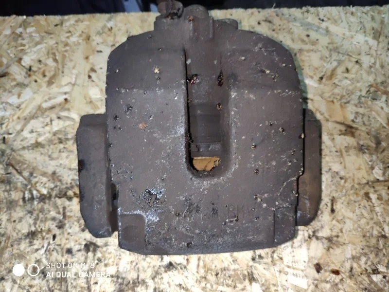 Суппорт тормозной BMW X5 3.0D E70