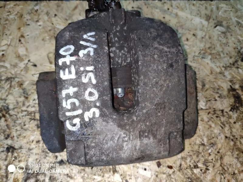 Суппорт тормозной BMW X5 3.0si 2007 E70