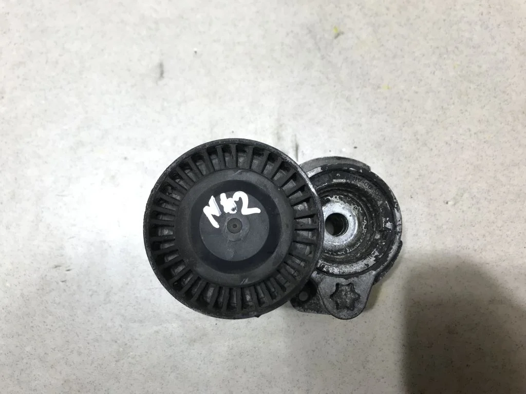 Натяжной ролик BMW E65 E60 E70