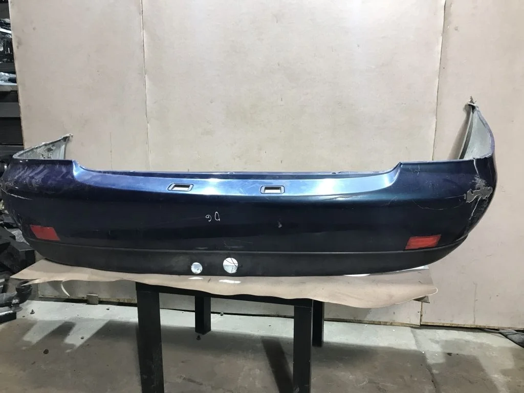 Бампер задний Nissan Primera P11