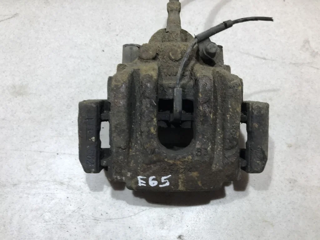 34216753680 Суппорт задний правый BMW E65