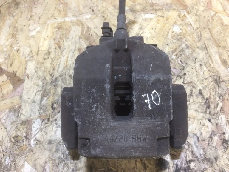 34216776787 Суппорт тормозной зад. лев. BMW X5 Е70