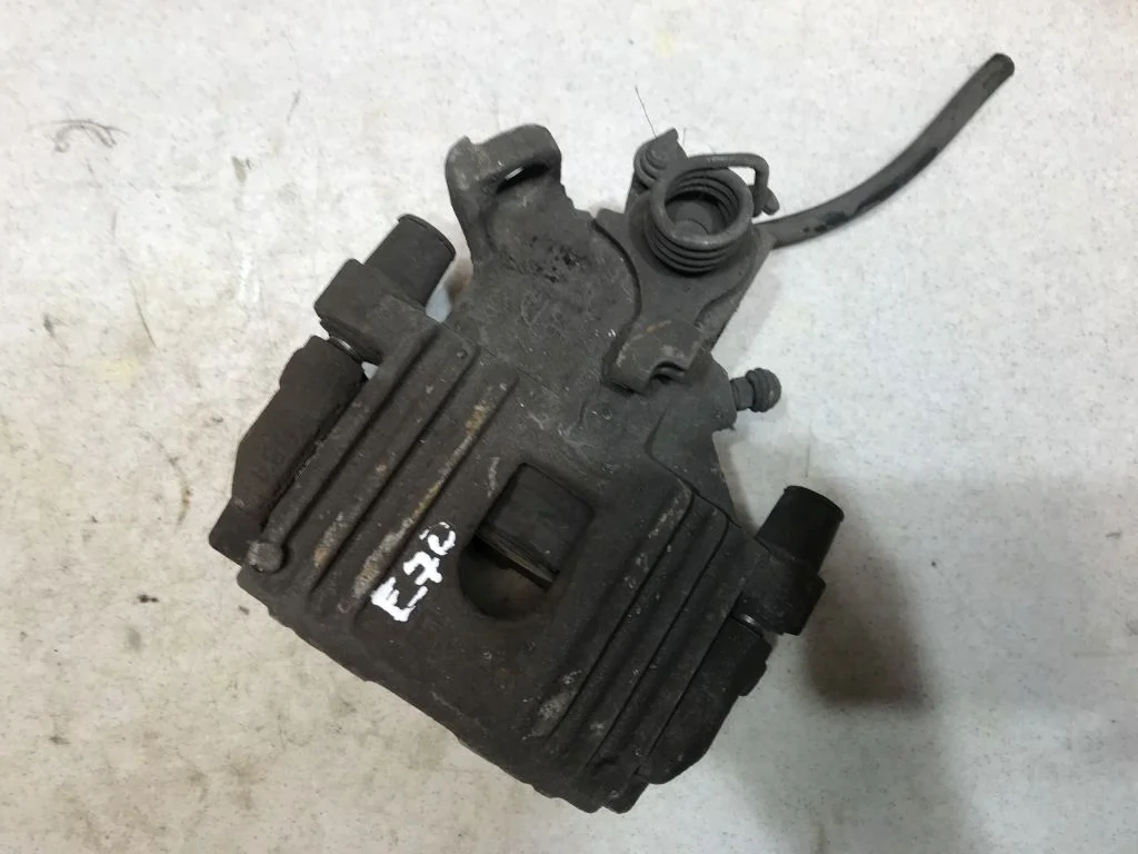 34216776787 Суппорт тормозной левый BMW X5 E70