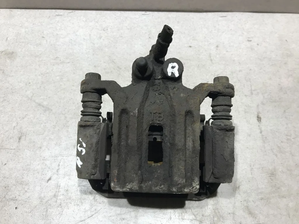 Суппорт задний правый Nissan Pathfinder R51