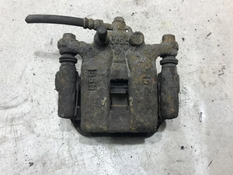 44011JG00A Суппорт задний левый Nissan X-Trail T31