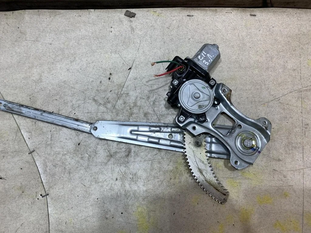 Стеклоподъемник задний левый Nissan Tiida С11