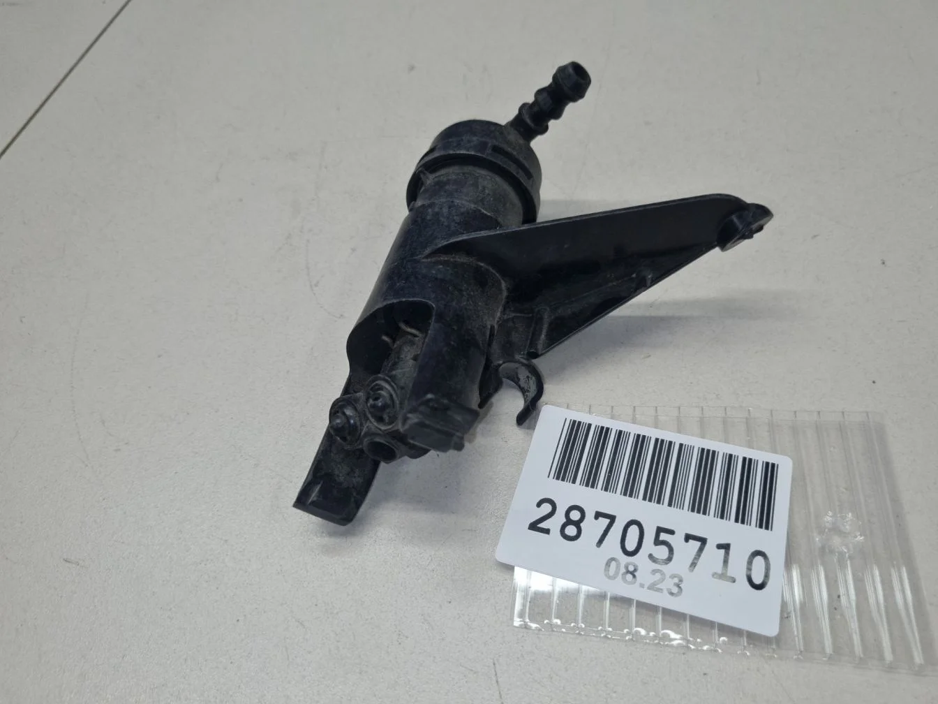 Форсунка омывателя фары левая для Nissan Tiida C11 2004-2013