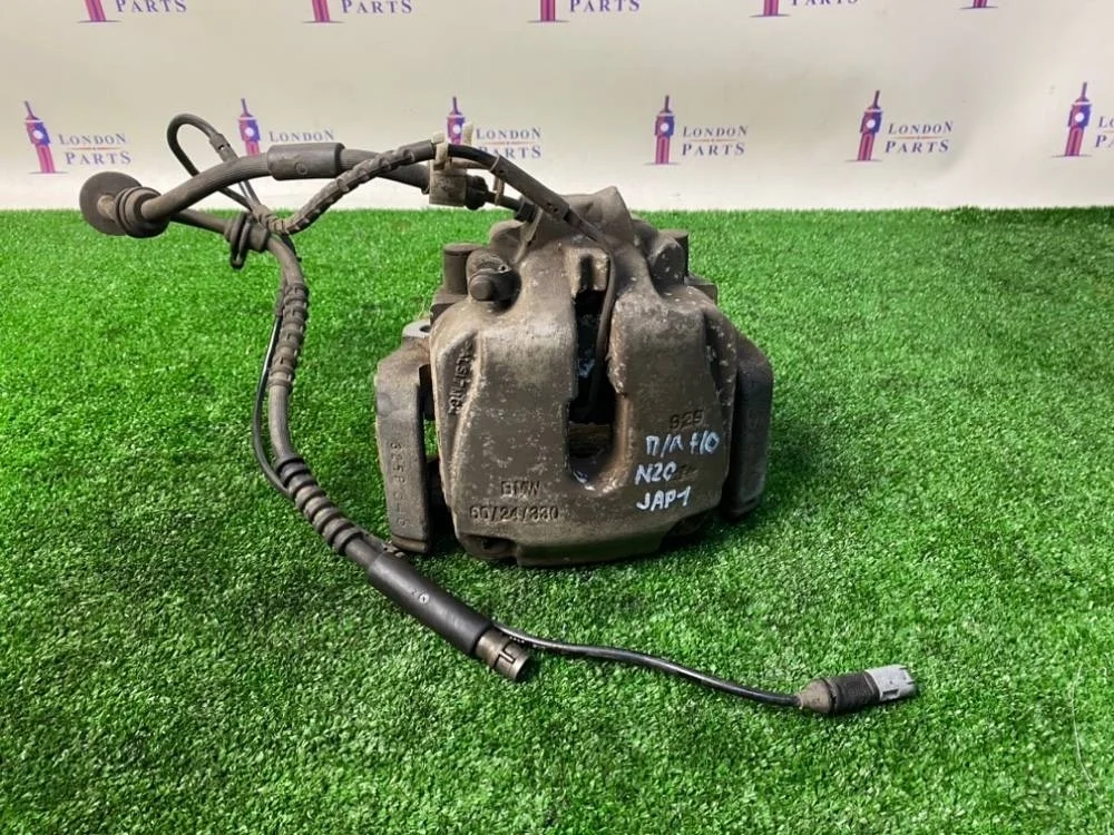 Суппорт тормозной BMW 520i F10