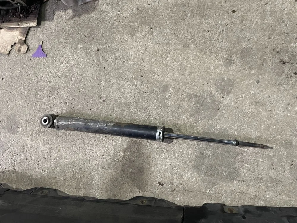 амортизатор задний nissan tiida C11