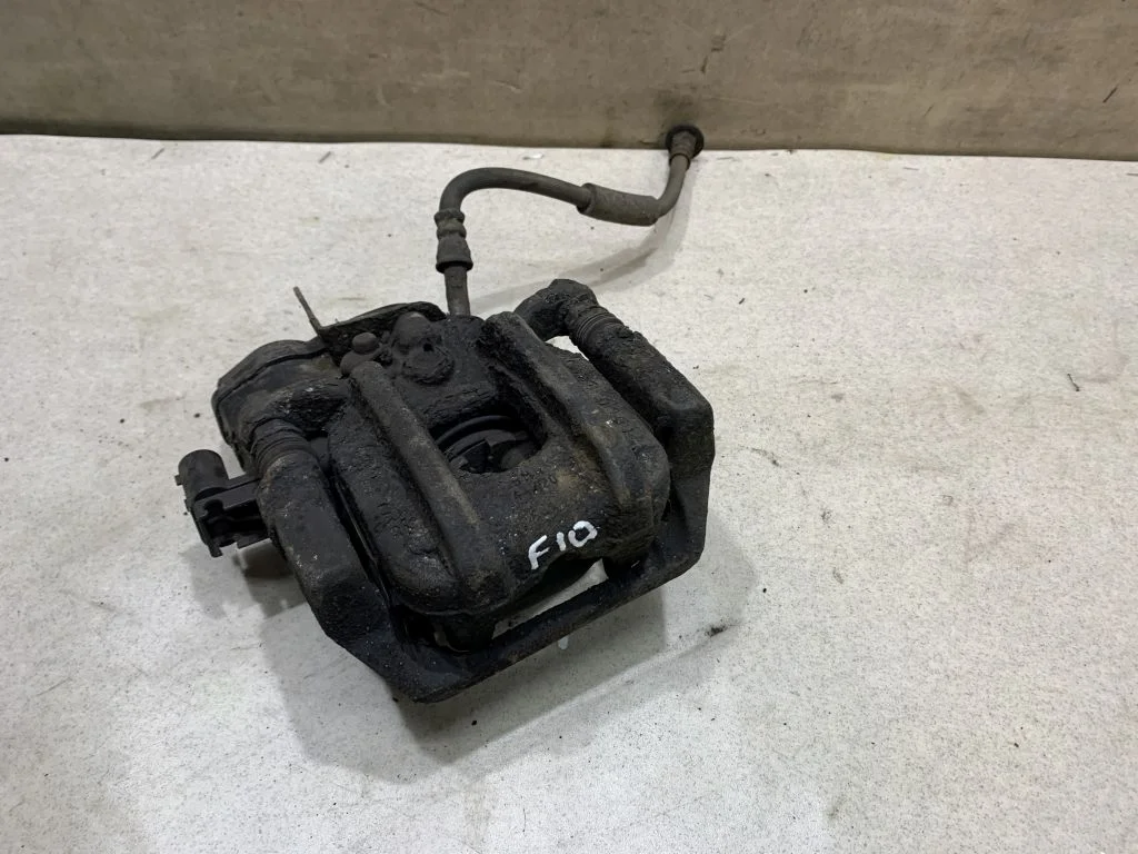 34216793041 Суппорт задний левый BMW F10