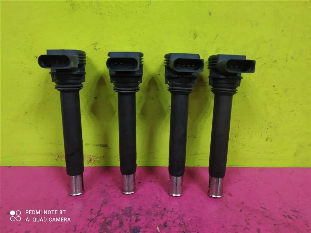 Катушка зажигания Passat Octavia Yeti 06H905115