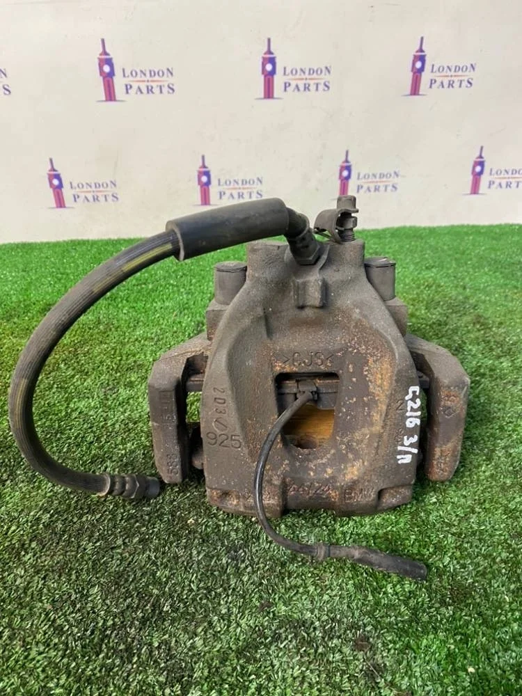 Суппорт тормозной BMW 740Li F02