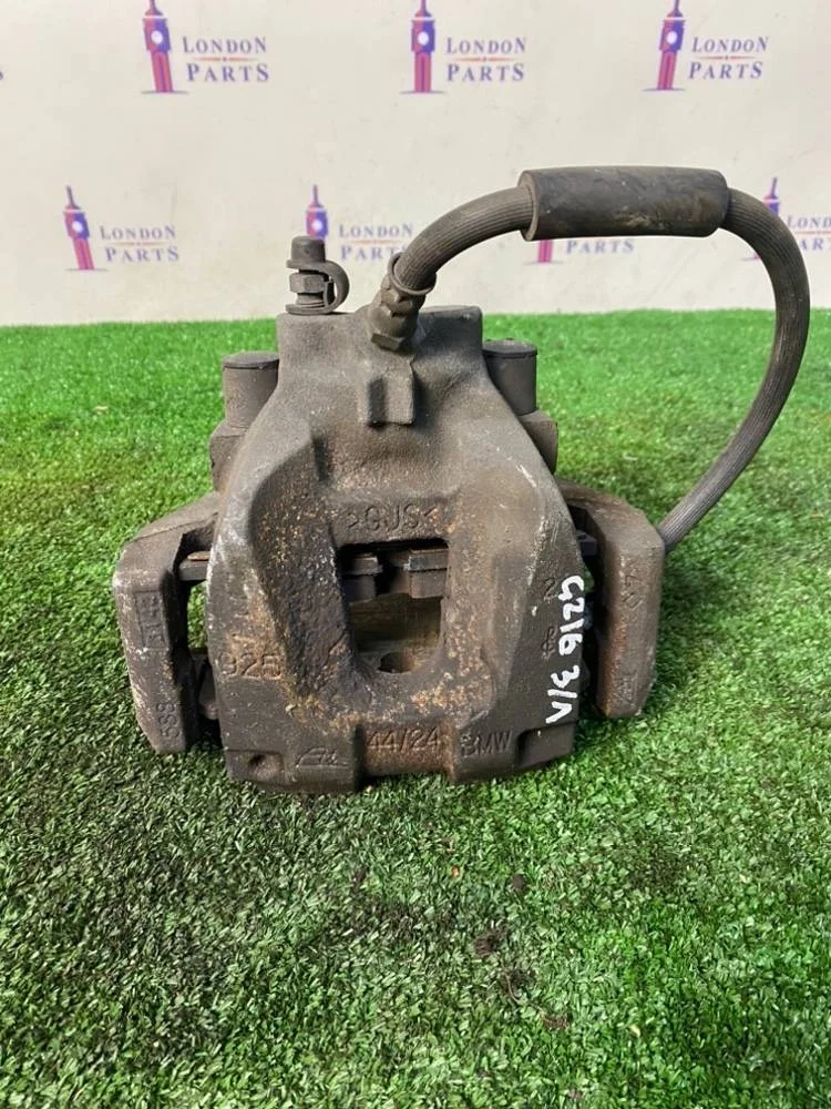 Суппорт тормозной BMW 740Li F02