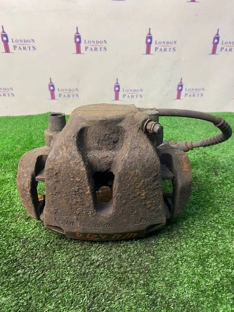 Суппорт тормозной BMW X5 3.0d E70