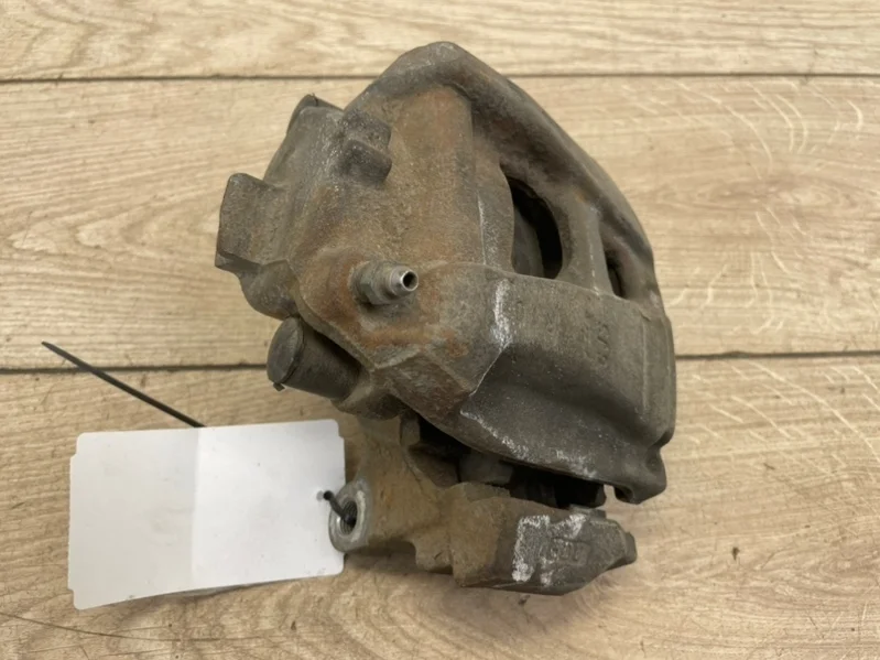 Суппорт тормозной VW Tiguan 2008-2018 5N