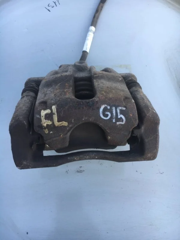 Суппорт тормозной Nissan Almera 2012 G15