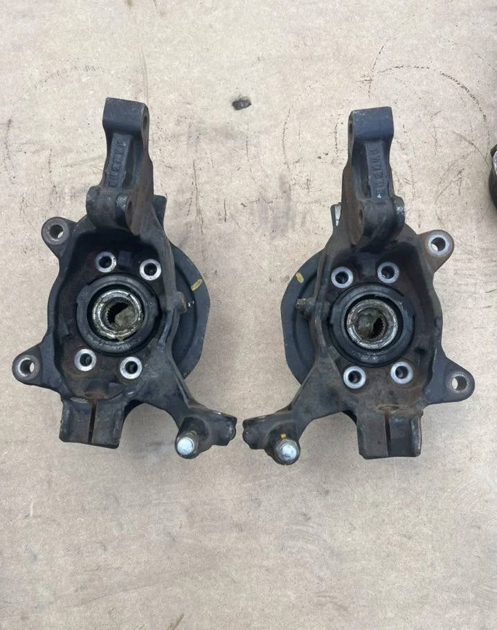 Кулак поворотный Nissan Teana J32