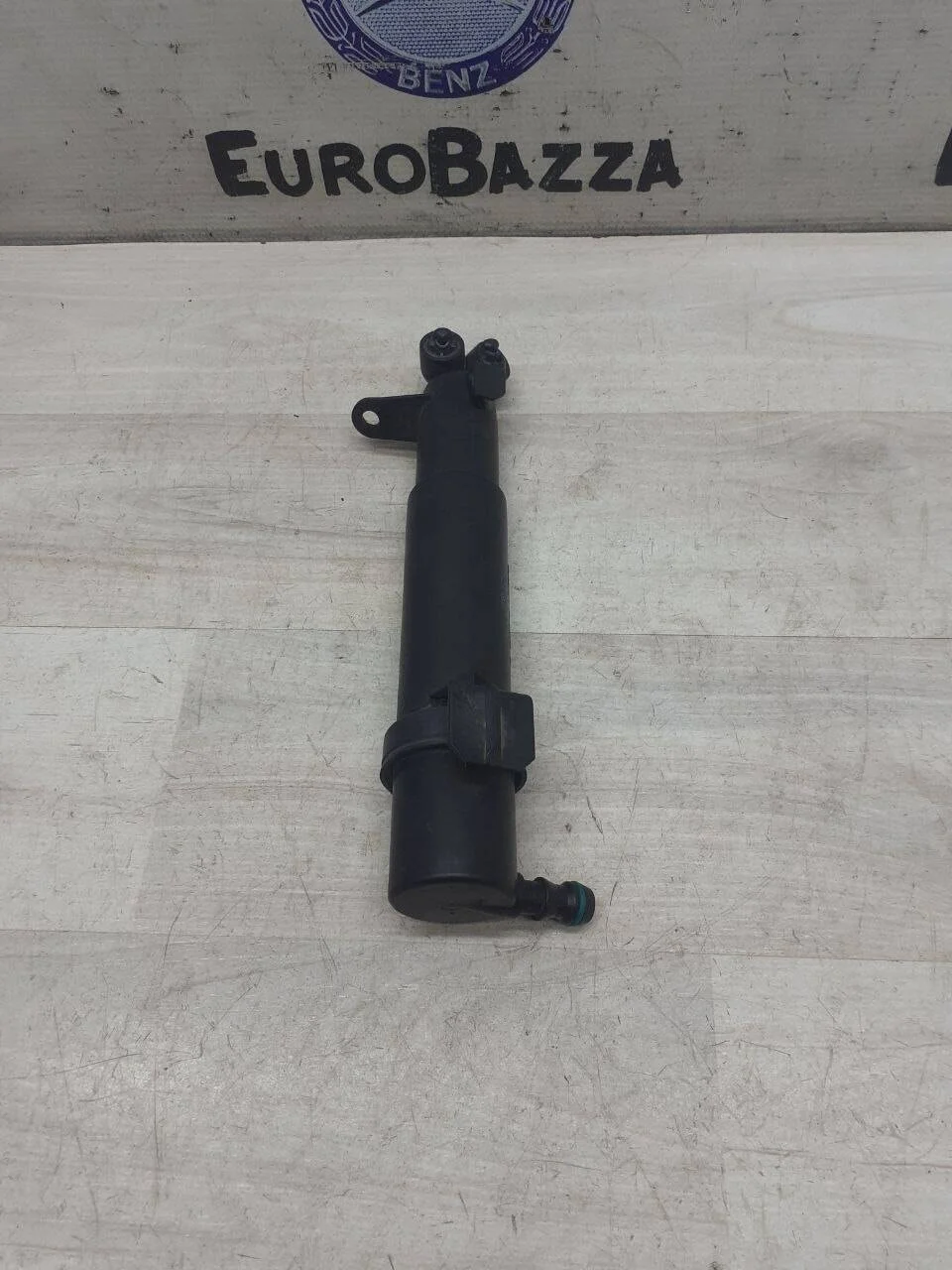 Форсунка фароомывателя левая Mercedes W219