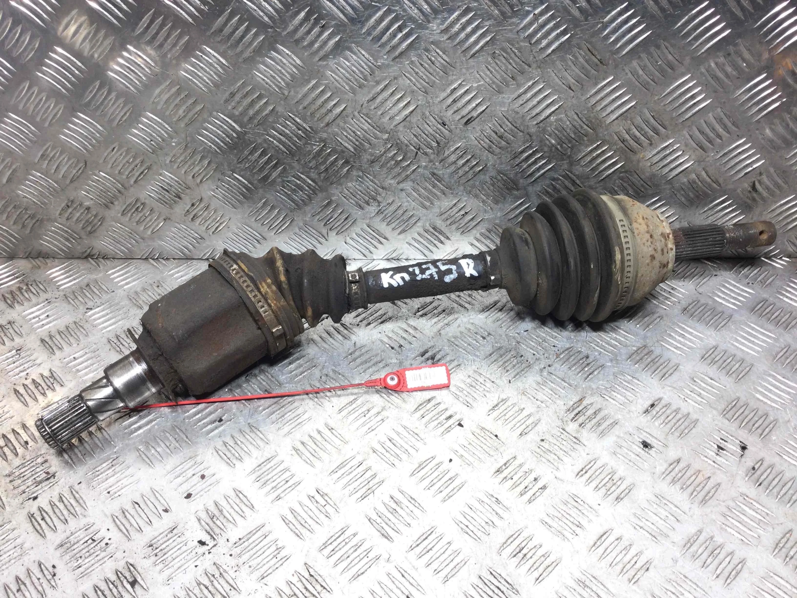 Полуось передняя правая (приводной вал, ШРУС) Nissan Navara D40 (2005-2010) дизель 2.5  Механика