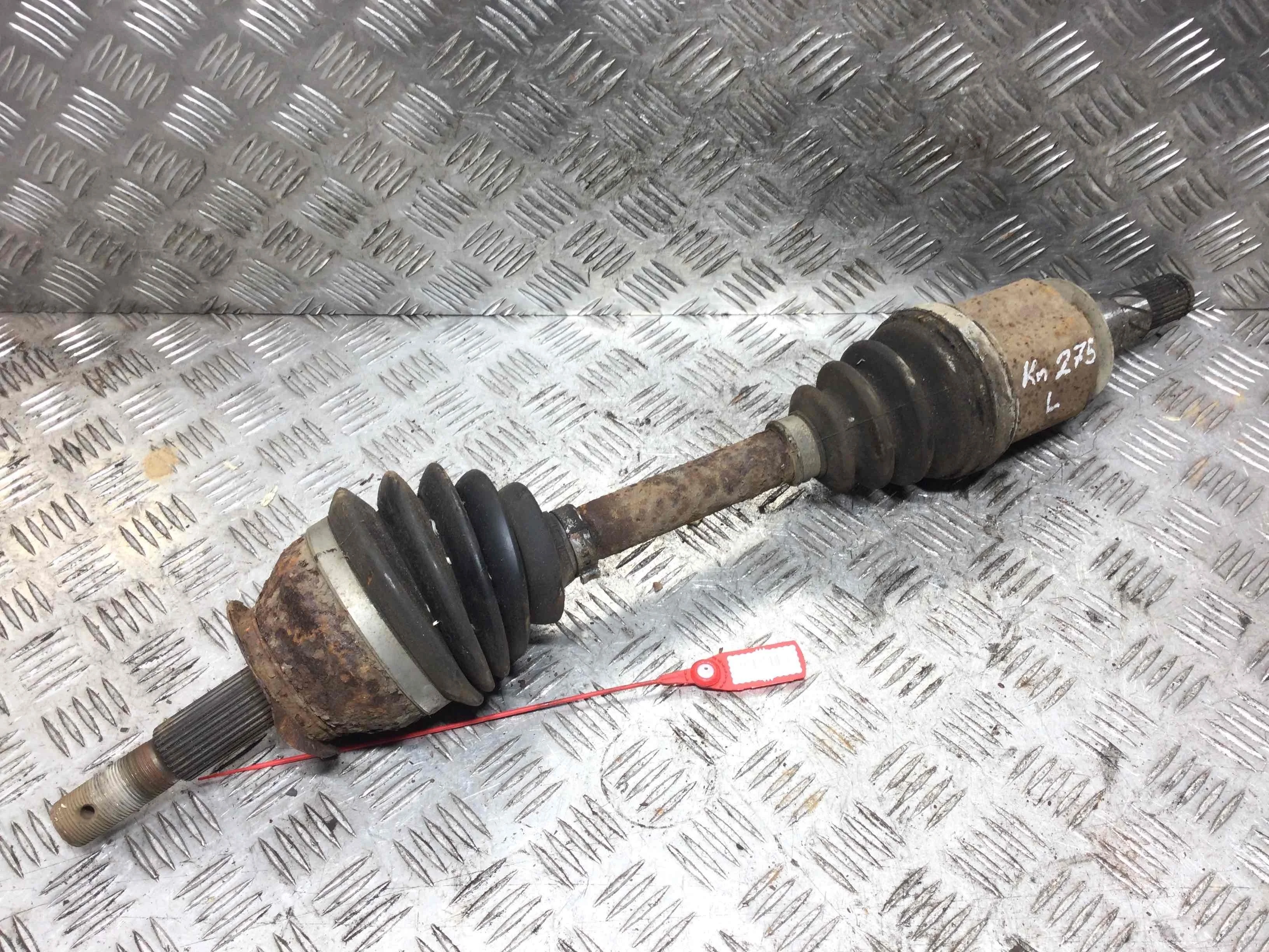 Полуось передняя левая (приводной вал, ШРУС) Nissan Navara D40 (2005-2010) дизель 2.5  Механика