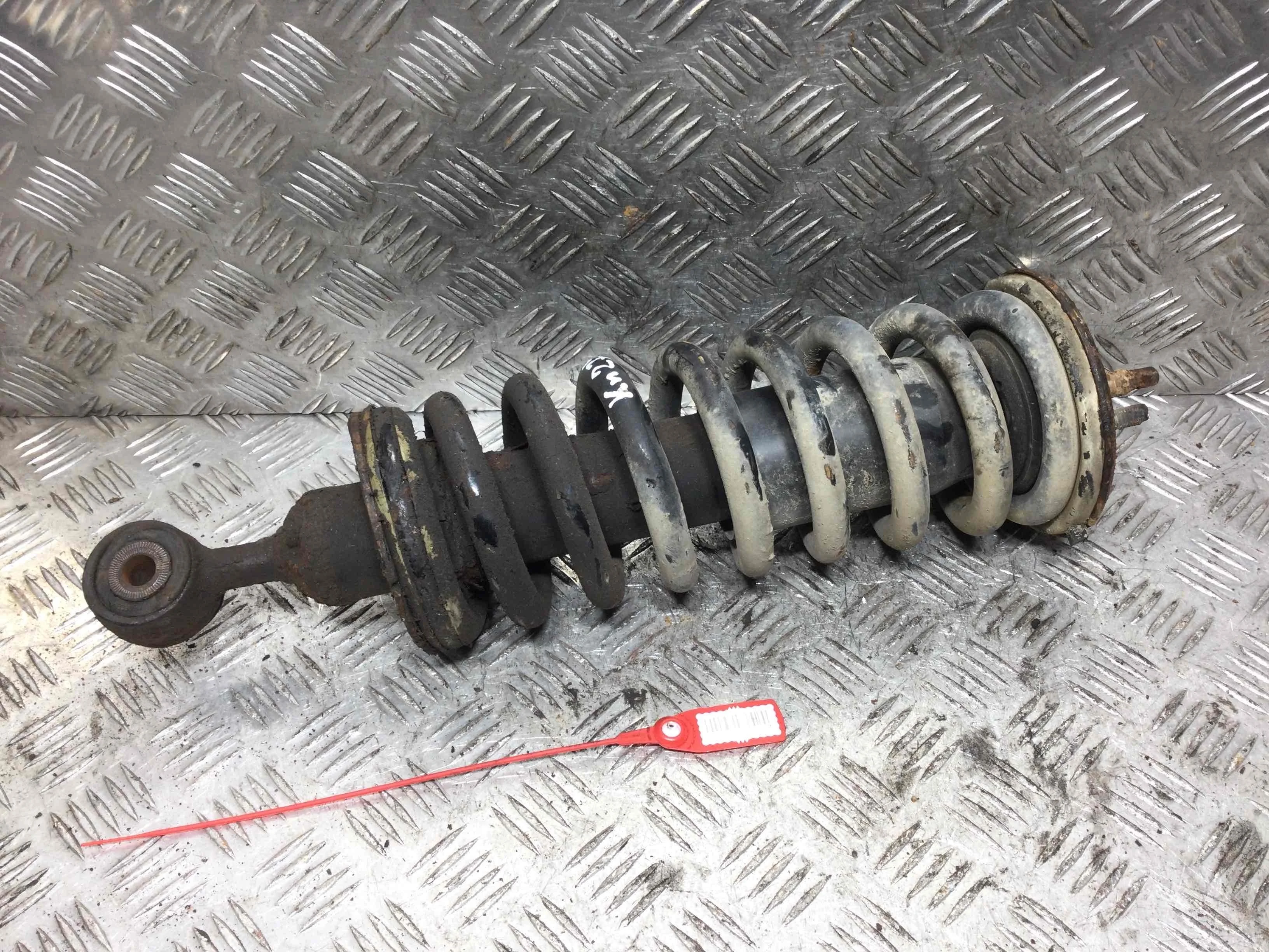 Стойка передняя правая Nissan Navara D40 (2005-2010) дизель 2.5  Механика