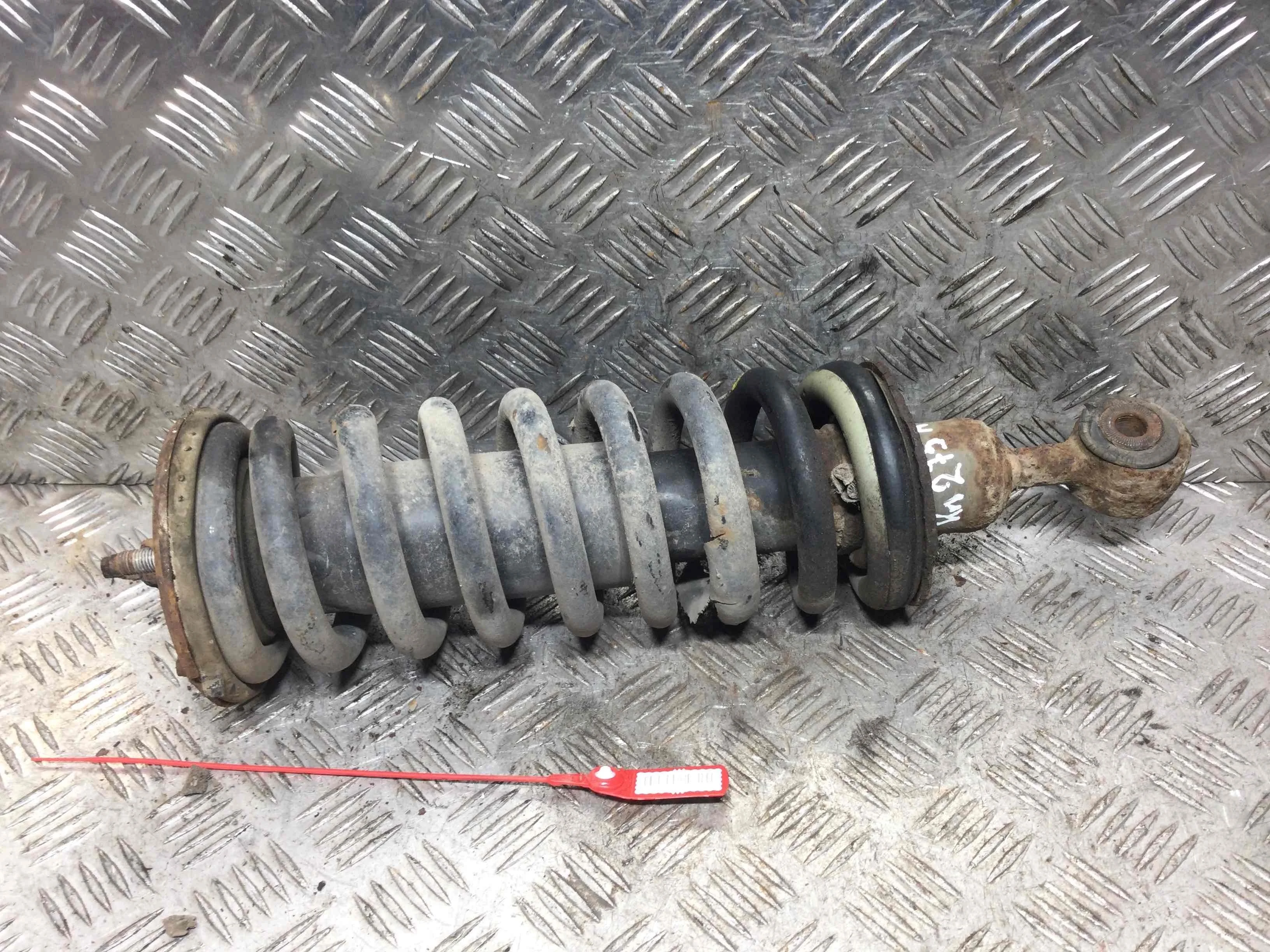 Стойка передняя правая Nissan Navara D40 (2005-2010) дизель 2.5  Механика