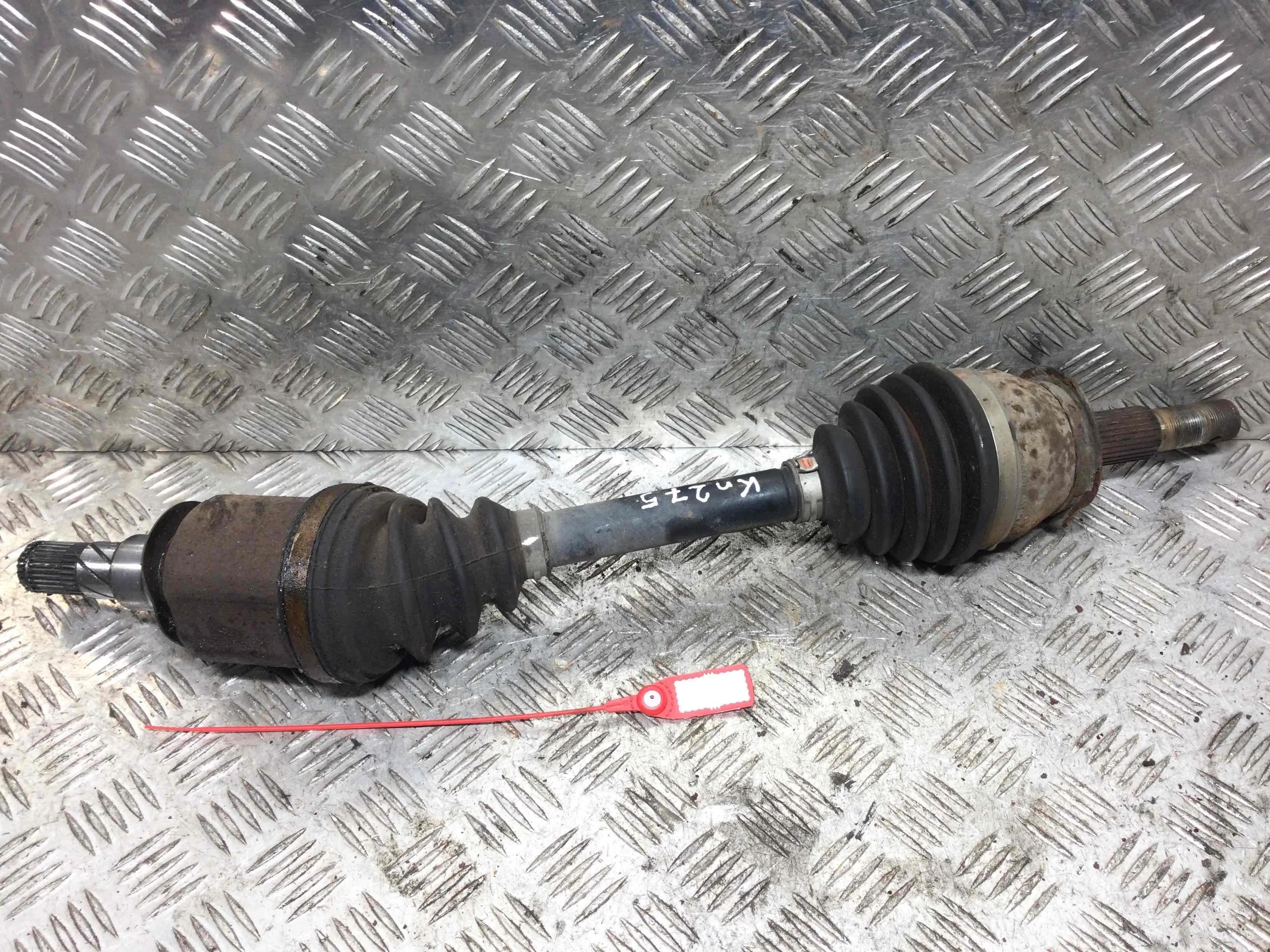 Полуось передняя левая (приводной вал, ШРУС) Nissan Navara D40 (2005-2010) дизель 2.5  Механика