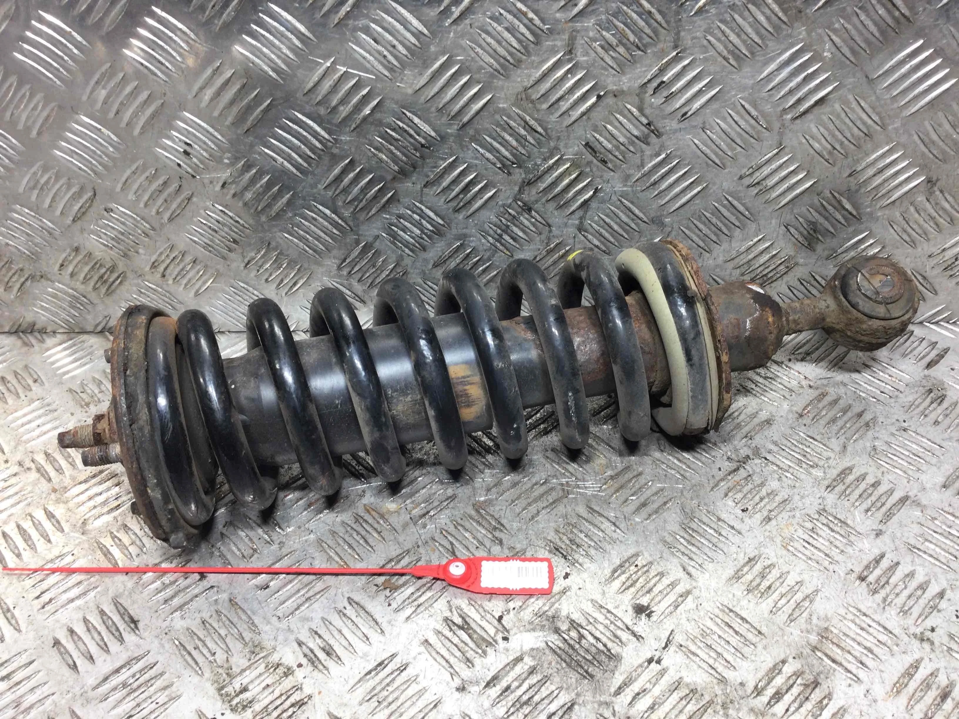 Стойка передняя правая Nissan Navara D40 (2005-2010) дизель 2.5  Механика