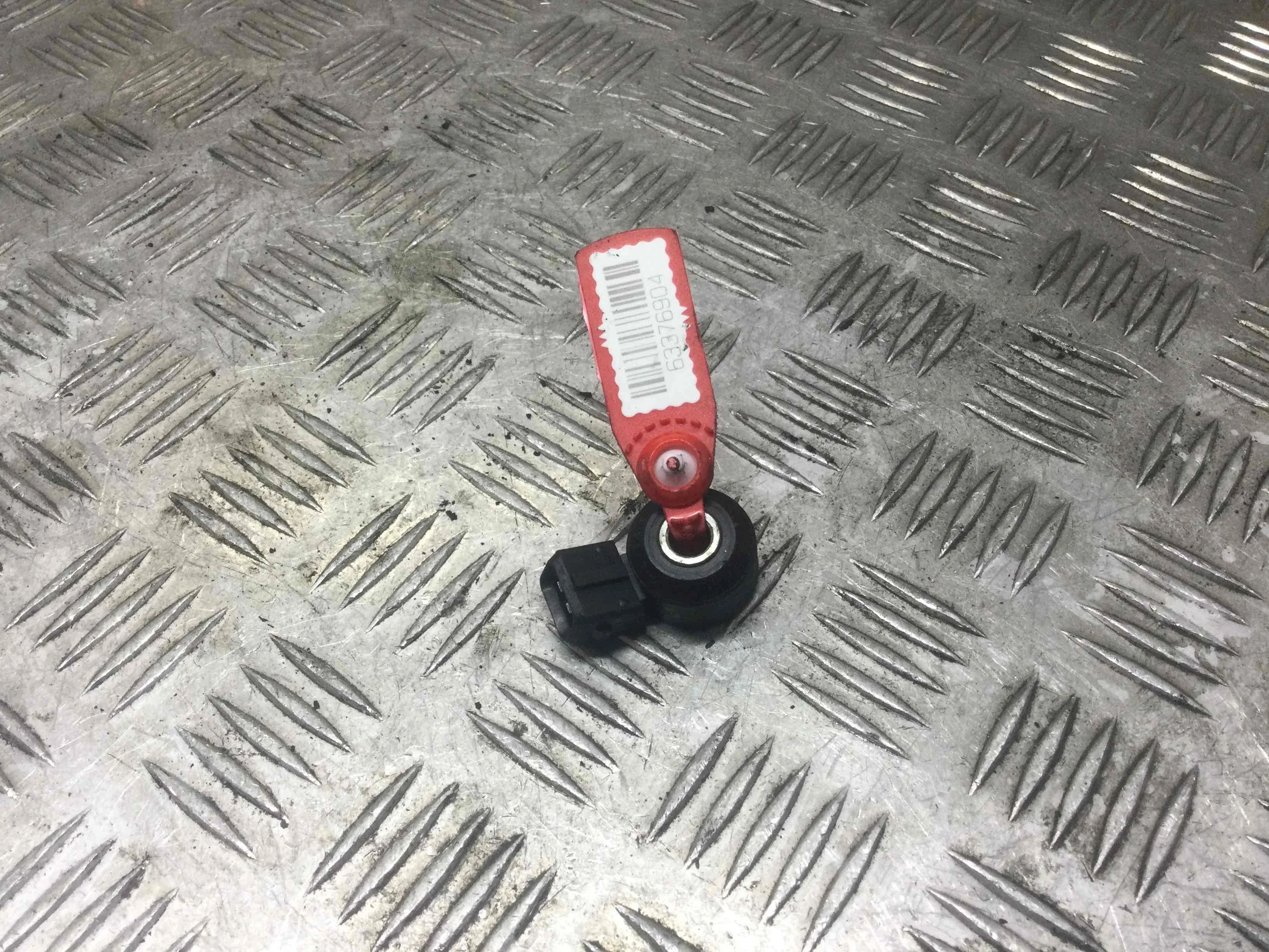 Датчик детонации Nissan Almera N16 [рестайлинг] (2003-2006) бензин 1.5 i Механика Х/б