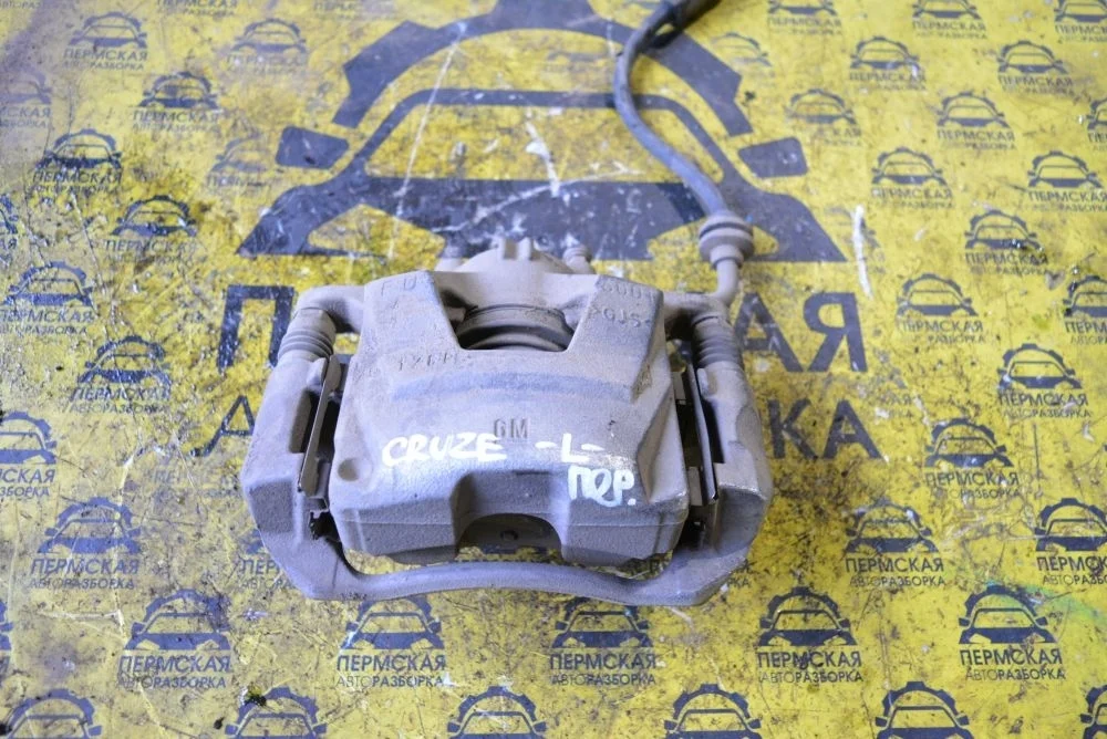 Суппорт тормозной передний левый Chevrolet Cruze