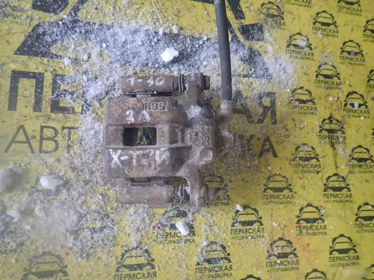 Суппорт тормозной задний левый Nissan X-Trail T30