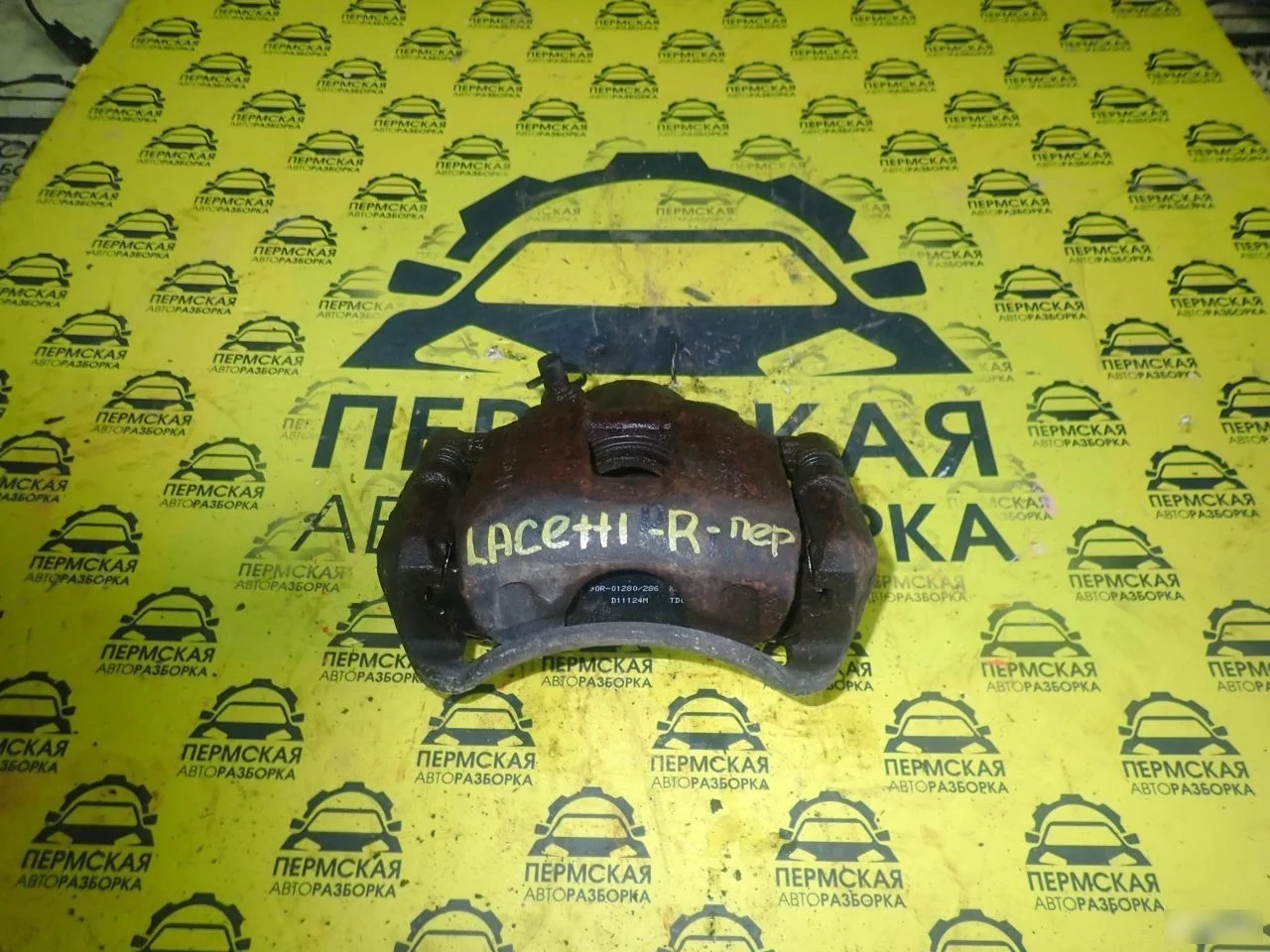 Суппорт передний правый Chevrolet Lacetti