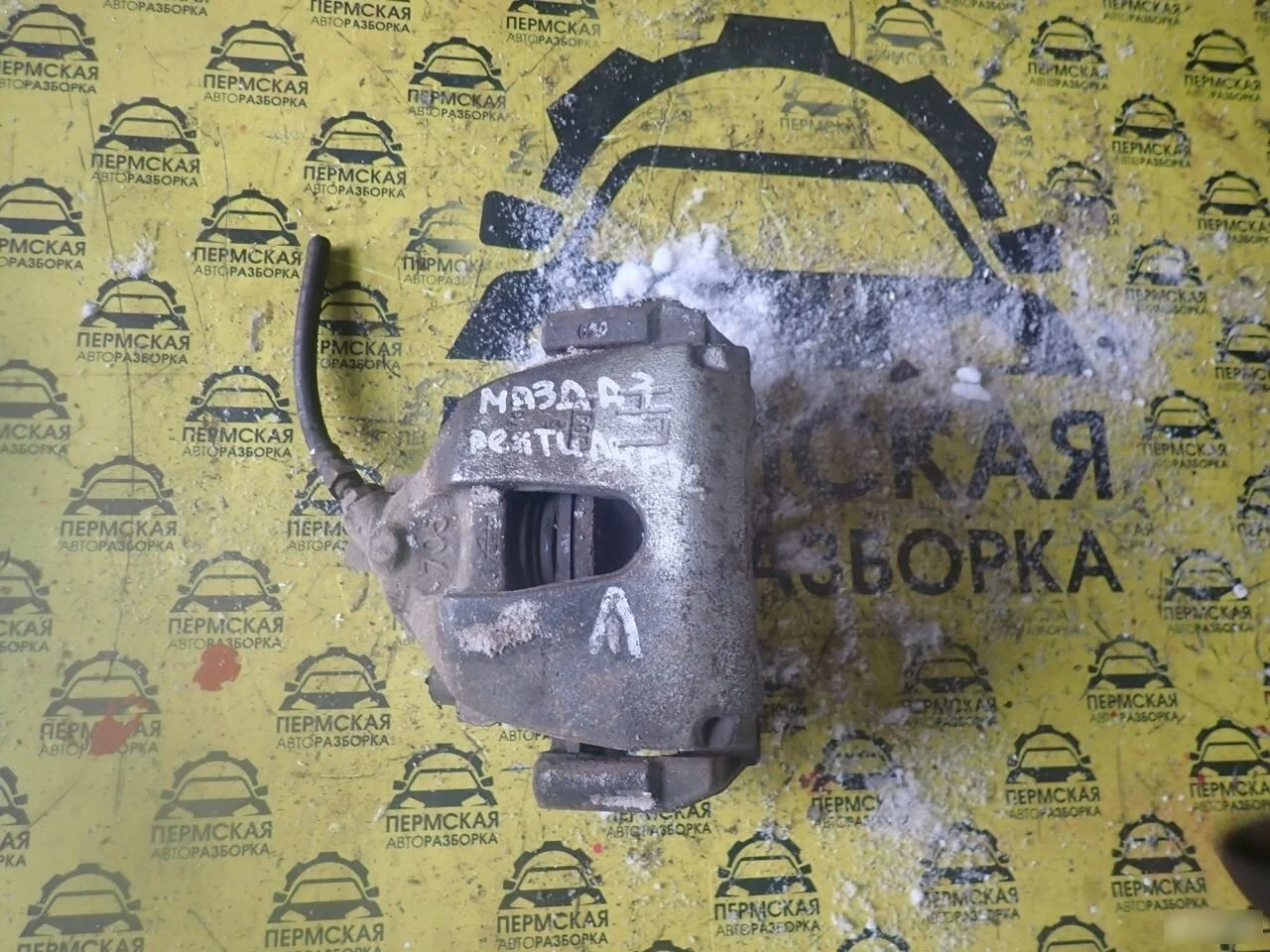 Суппорт тормозной передний левый Mazda 3 BK