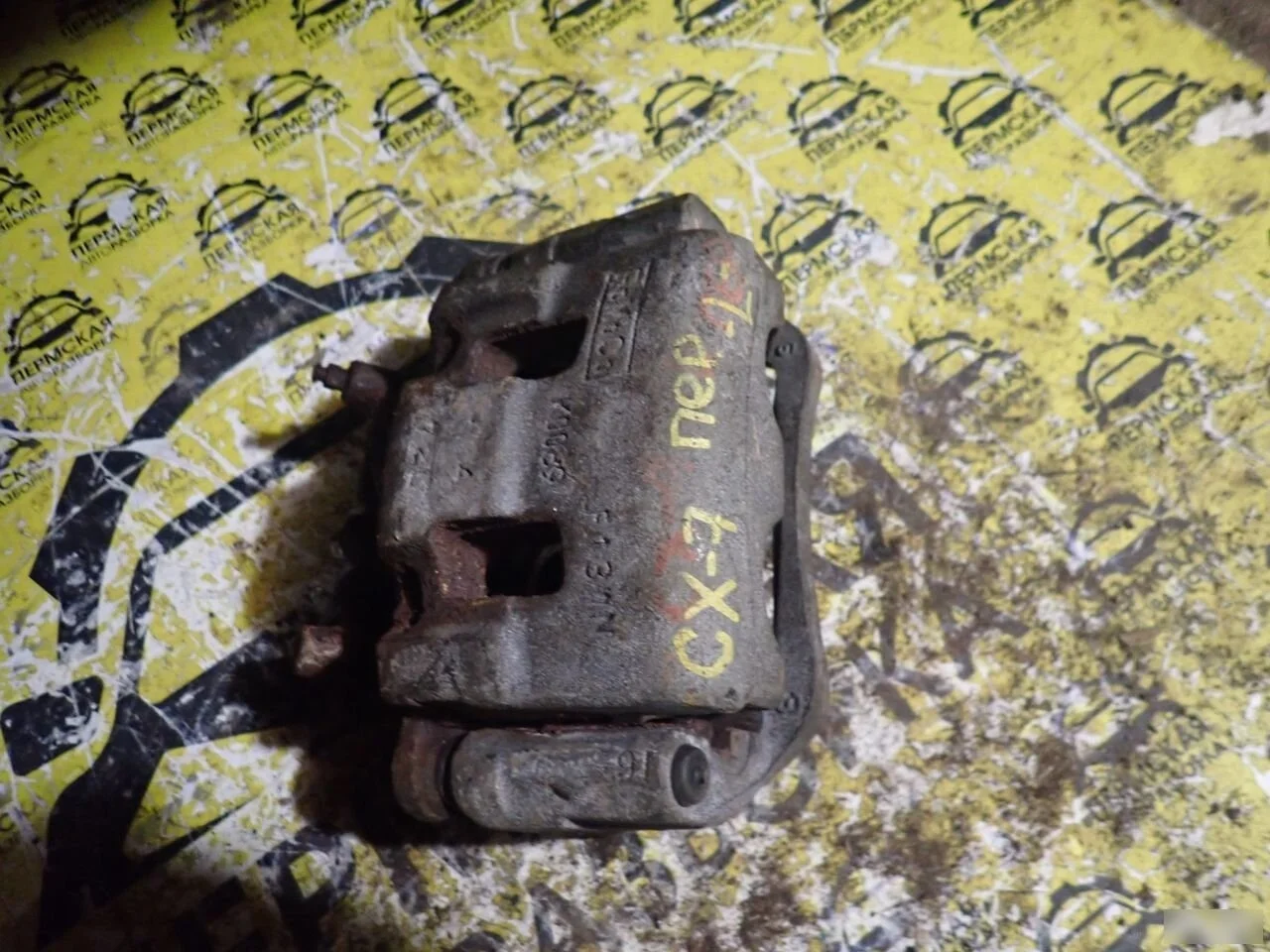 Суппорт тормозной передний левый для Mazda CX 7