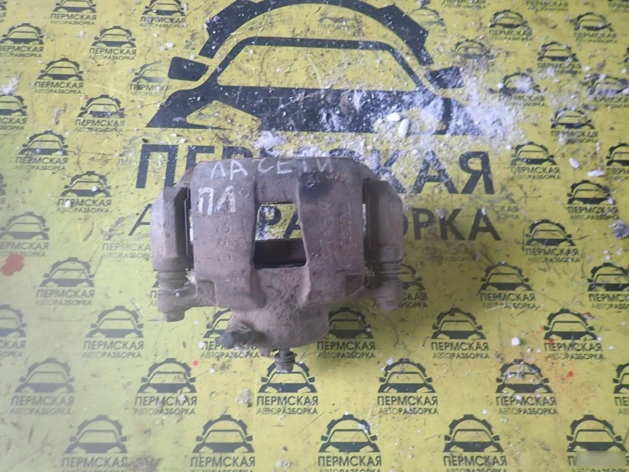 Суппорт передний левый Chevrolet Lacetti