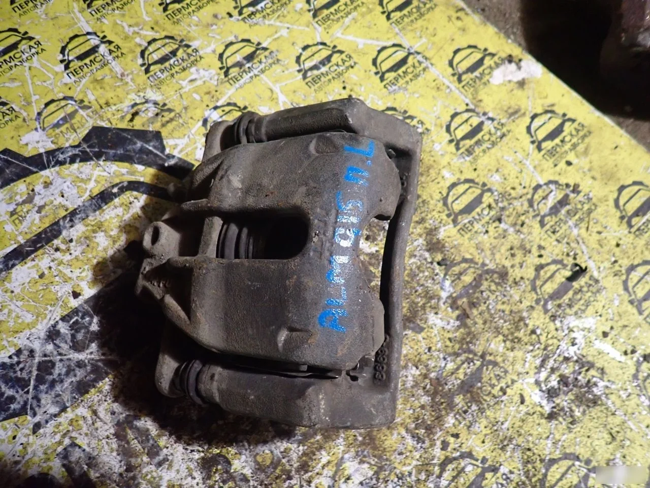 Суппорт тормозной передний левый Nissan Almera G15