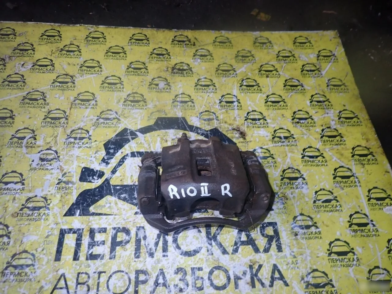 Суппорт тормозной передний правый для Kia RIO 2