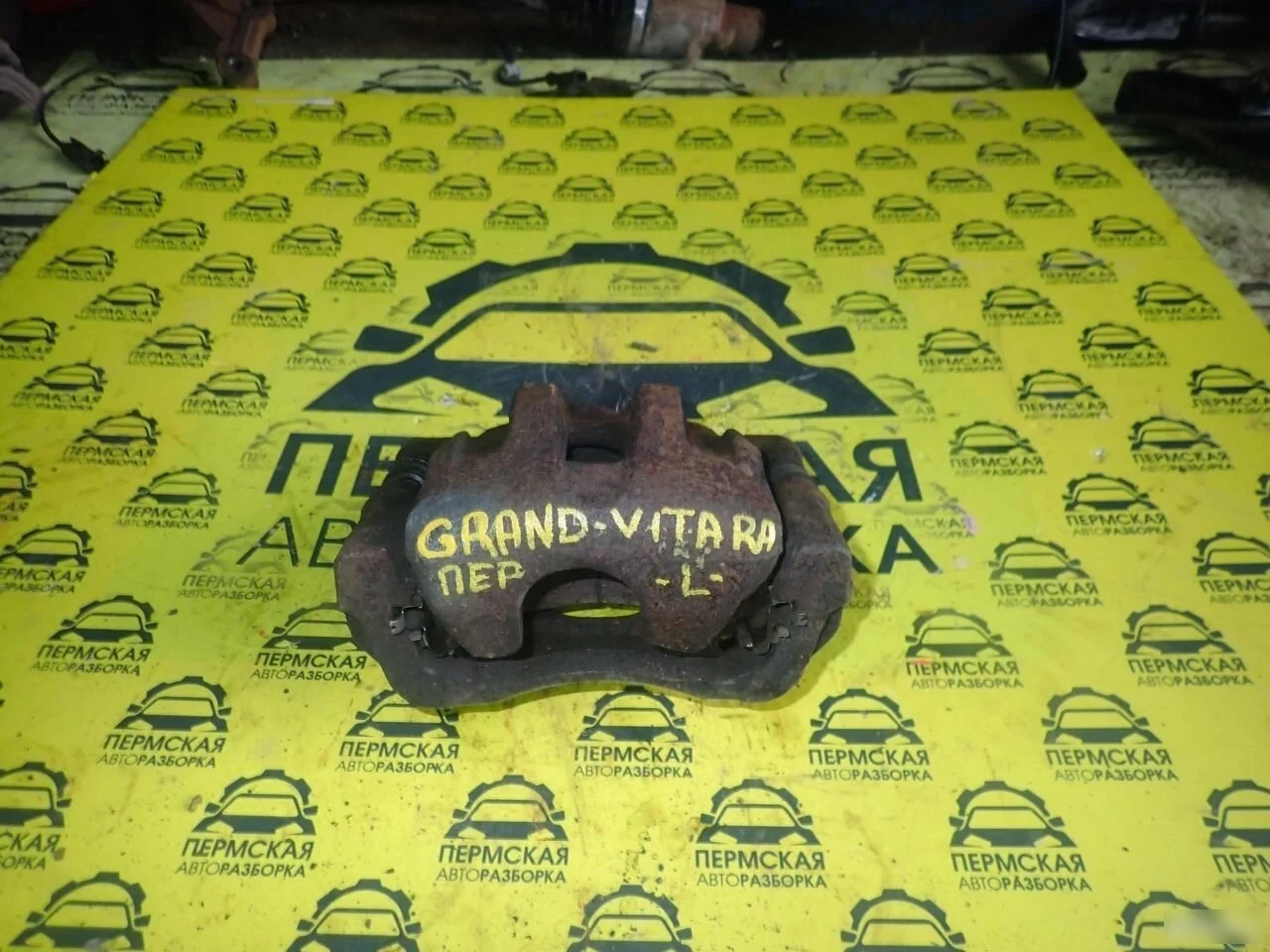 Суппорт передний левый Suzuki Grand Vitara 05-15