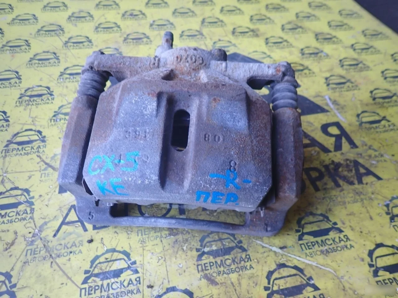 Суппорт тормозной передний правый для Mazda CX 5 1