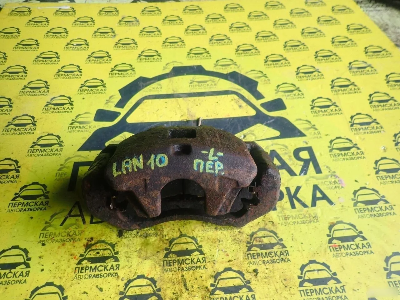 Суппорт передний левый Mitsubishi Lancer 10