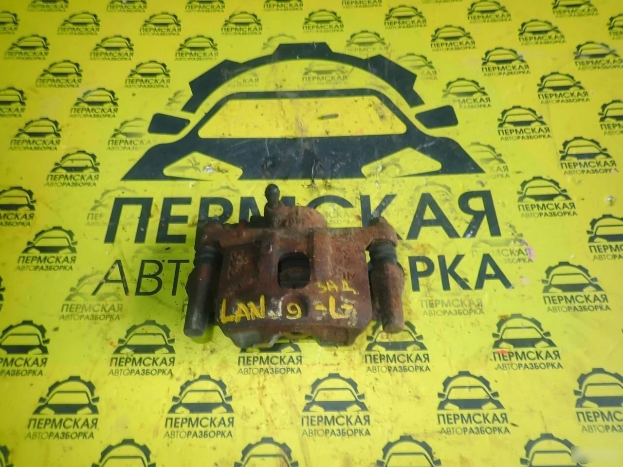 Суппорт задний левый Mitsubishi Lancer 9