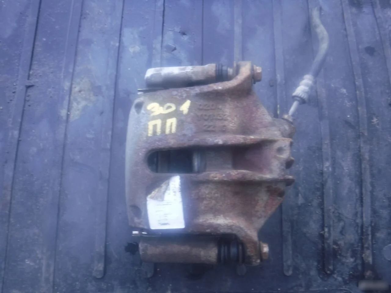 Суппорт тормозной передний Peugeot 301