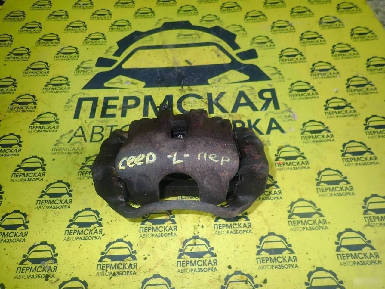 Суппорт тормозной передний левый Kia Ceed 07-12